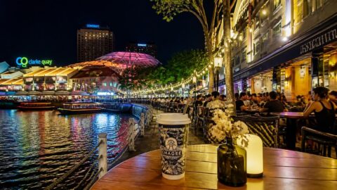 Clarke Quay and Boat Quay riverside nightlife promenade in Singapore at night
