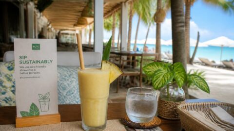 Sustainable beverage service with eco-friendly paper straws at a beachfront restaurant in Boracay
