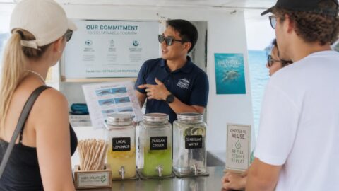 Eco-conscious tour operator in Kota Kinabalu using paper straws and promoting marine conservation