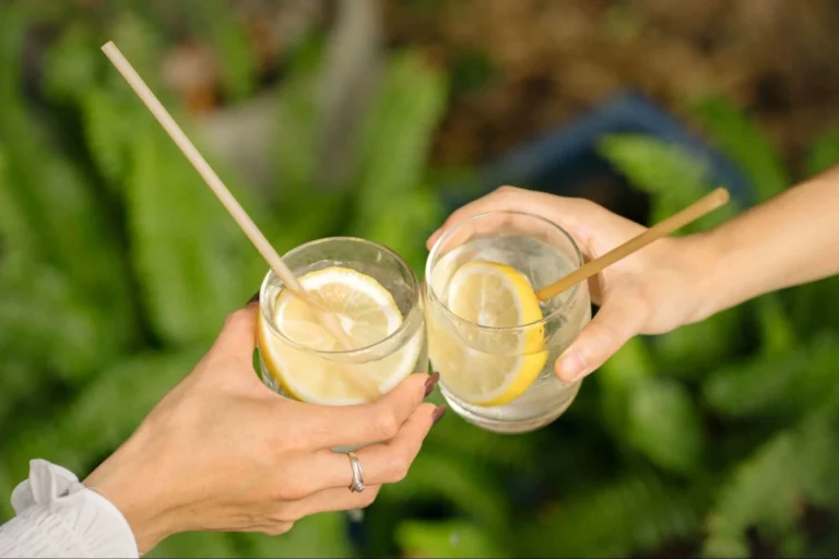 Cafe bar counter displaying cold beverages with eco-friendly compostable and paper straws